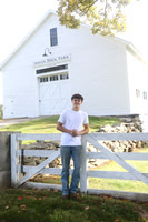 Just a young man by the barn